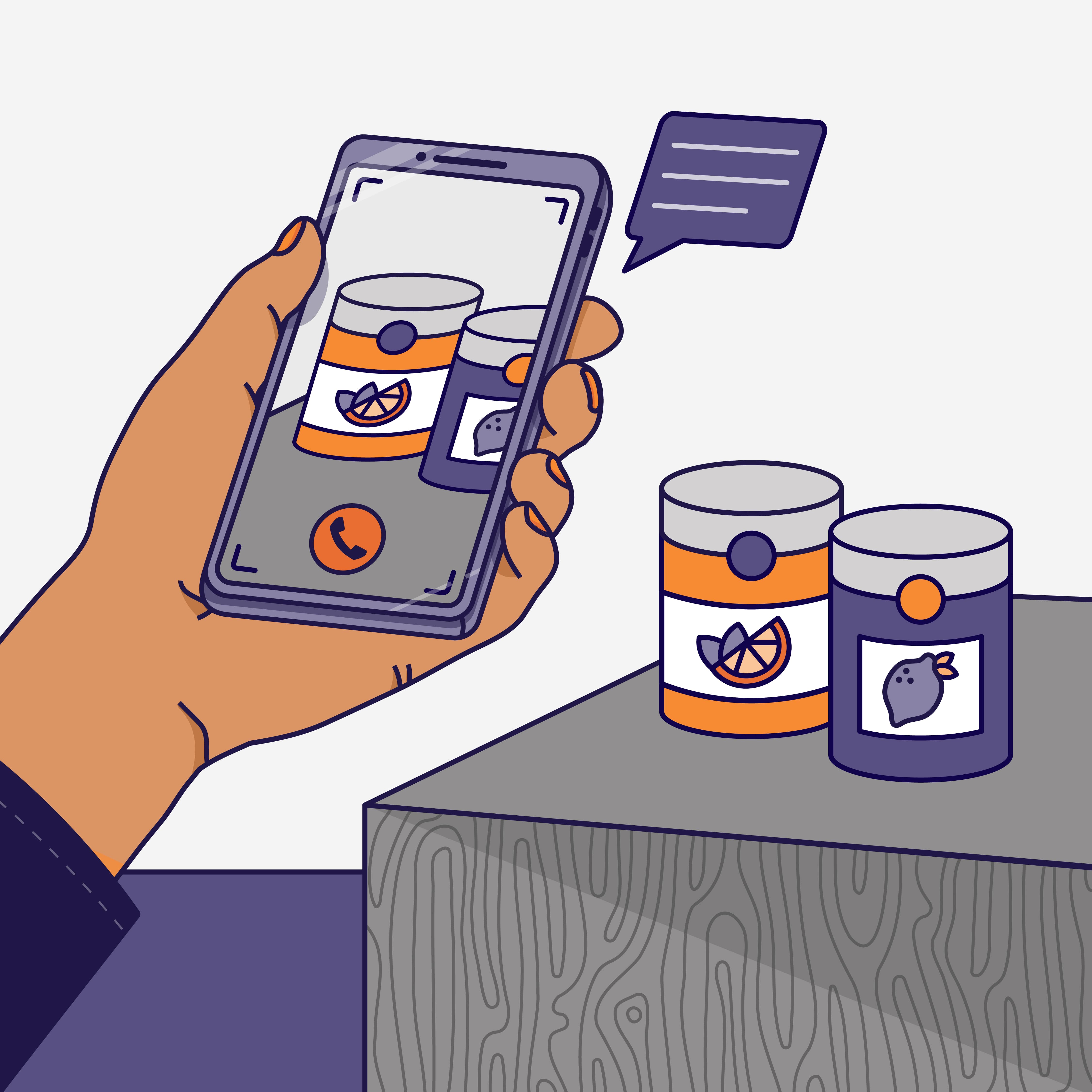 An illustration of a hand holding a mobile phone. In the background are 2 cans of food on a bench. The screen of the mobile shows the 2 cans. There is a text bubble indicating that the phone is giving a description of the cans.