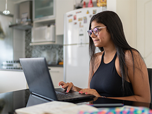 Woman working on a laptop